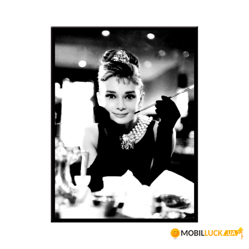  Audrey Hepburn - Holly Golightli